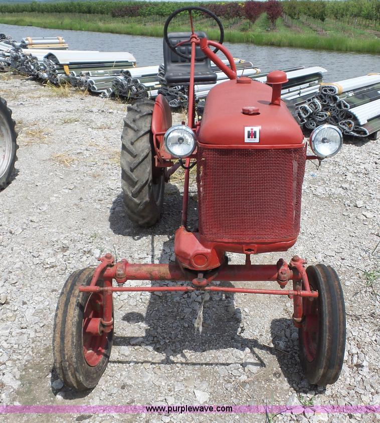 image for item K1671 Mccormick Farmall Cub tractor