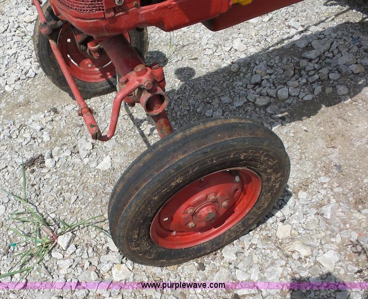 image for item K1671 Mccormick Farmall Cub tractor