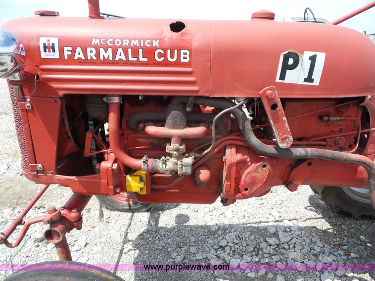 image for item K1671 Mccormick Farmall Cub tractor