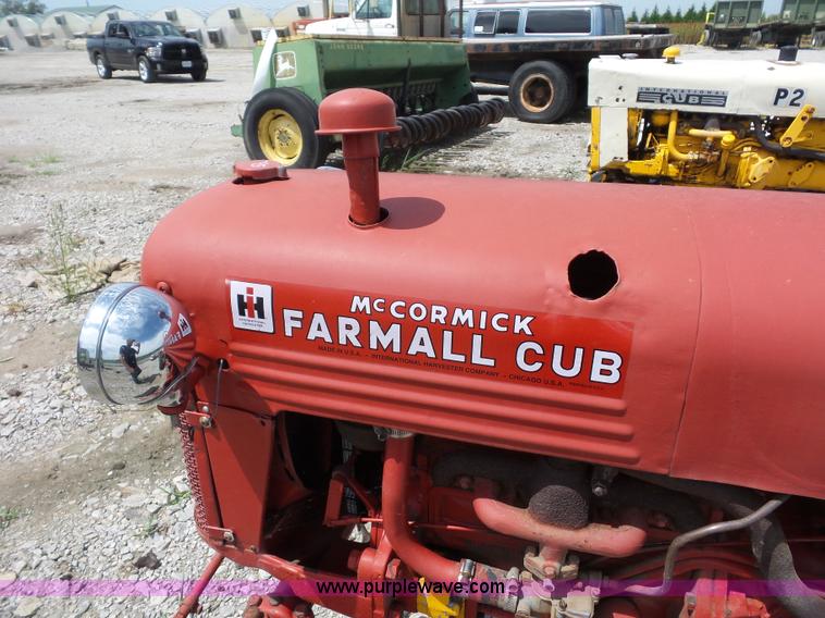 image for item K1671 Mccormick Farmall Cub tractor