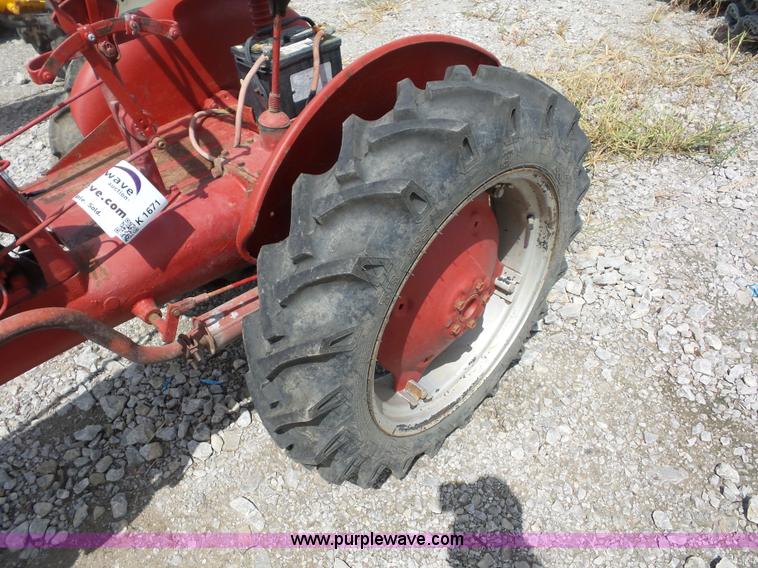 image for item K1671 Mccormick Farmall Cub tractor