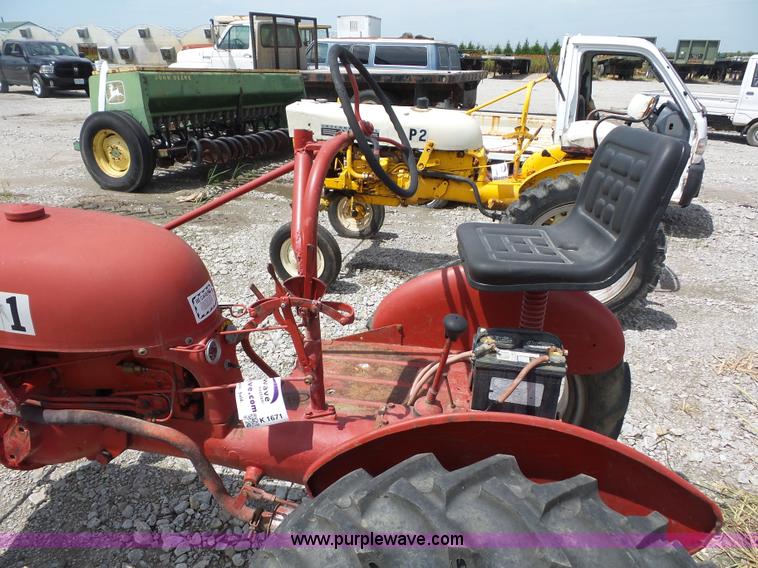 image for item K1671 Mccormick Farmall Cub tractor