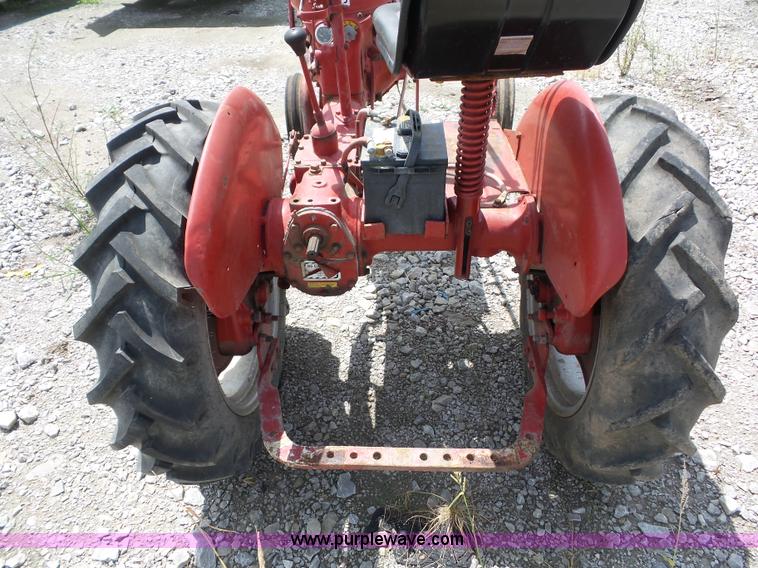 image for item K1671 Mccormick Farmall Cub tractor
