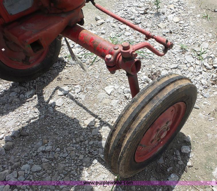 image for item K1671 Mccormick Farmall Cub tractor