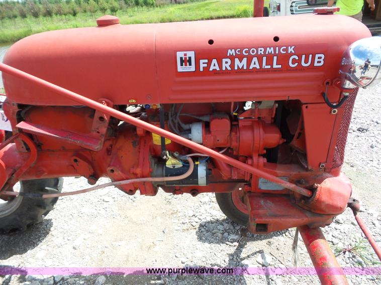 image for item K1671 Mccormick Farmall Cub tractor