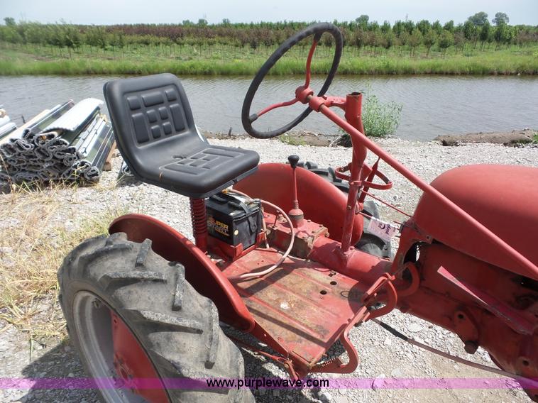 image for item K1671 Mccormick Farmall Cub tractor