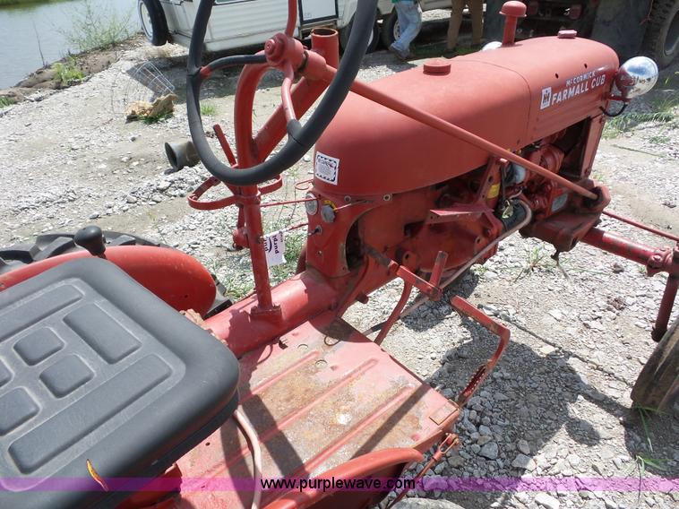image for item K1671 Mccormick Farmall Cub tractor