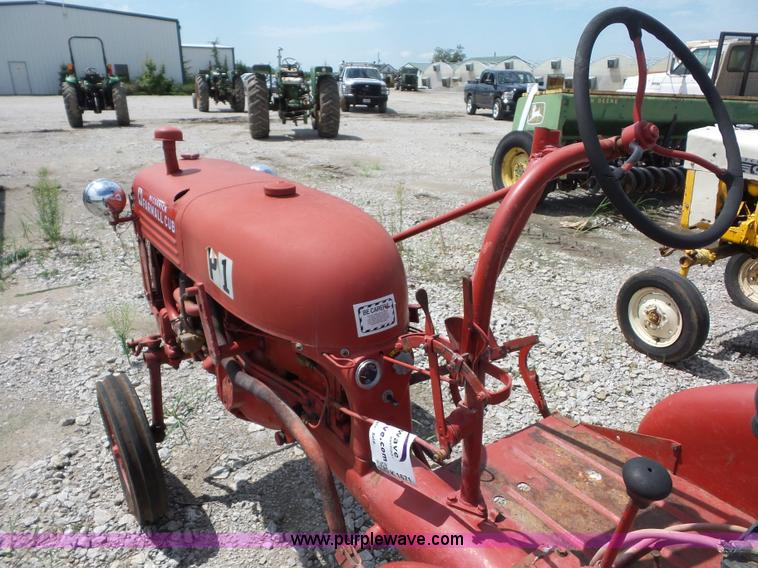 image for item K1671 Mccormick Farmall Cub tractor
