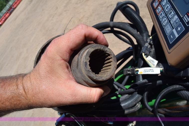 image for item K2844 2012 John Deere 568 round baler