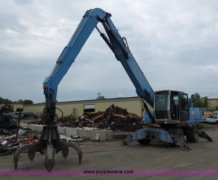 image for item BS9643 2005 Terex-Fuchs MHL340 rubber tire excavator