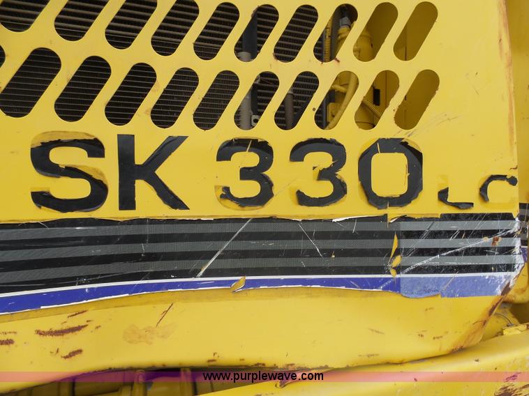 image for item J5476 2004 Kobelco SK330LC excavator