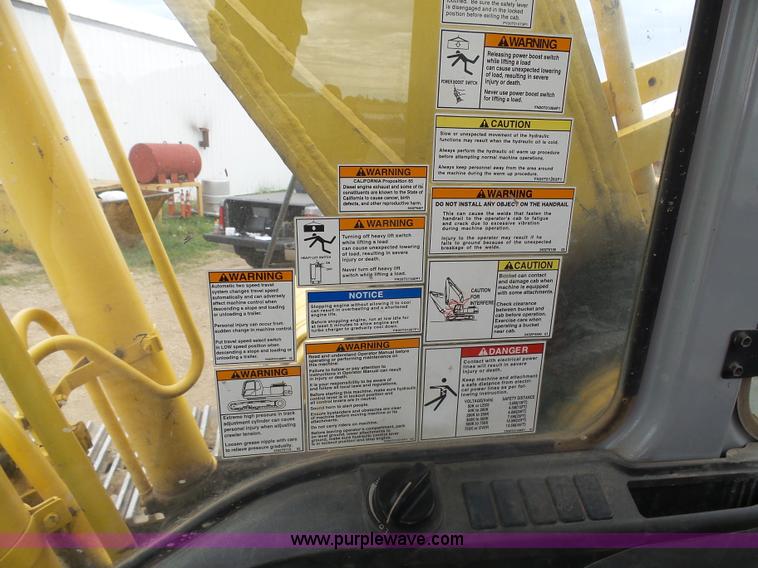 image for item J5476 2004 Kobelco SK330LC excavator