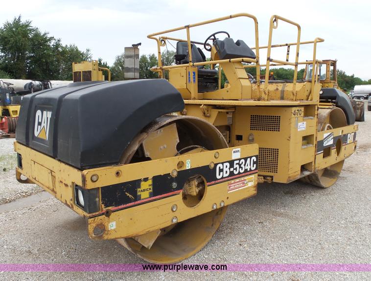 image for item K1180 2001 Caterpillar CB-534C double drum roller