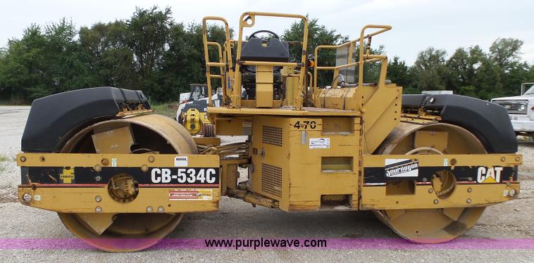 image for item K1180 2001 Caterpillar CB-534C double drum roller