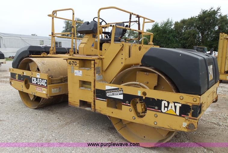 image for item K1180 2001 Caterpillar CB-534C double drum roller
