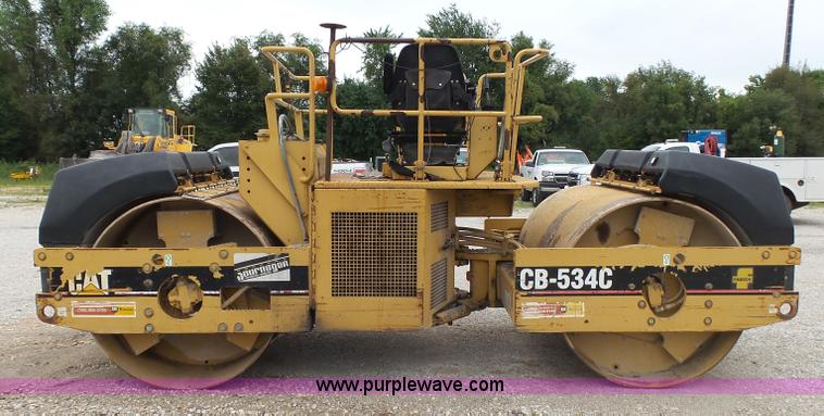 image for item K1180 2001 Caterpillar CB-534C double drum roller