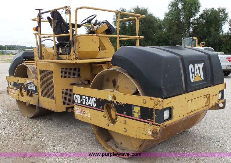 image for item K1180 2001 Caterpillar CB-534C double drum roller