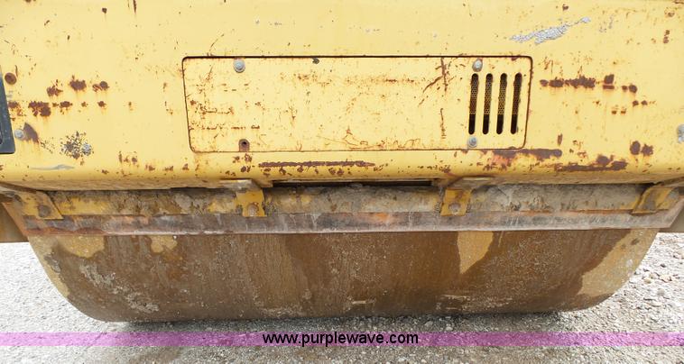 image for item K1180 2001 Caterpillar CB-534C double drum roller