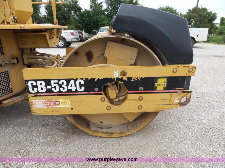 image for item K1180 2001 Caterpillar CB-534C double drum roller