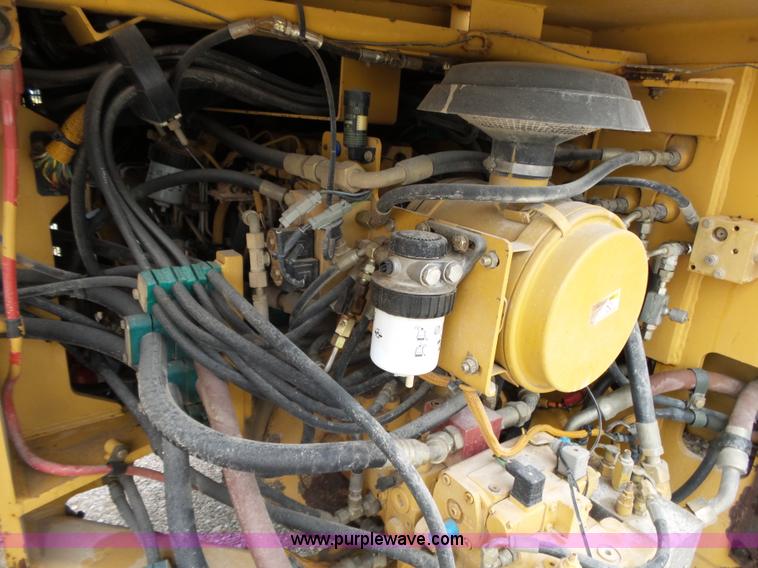 image for item K1180 2001 Caterpillar CB-534C double drum roller