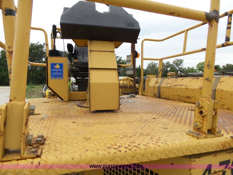 image for item K1180 2001 Caterpillar CB-534C double drum roller