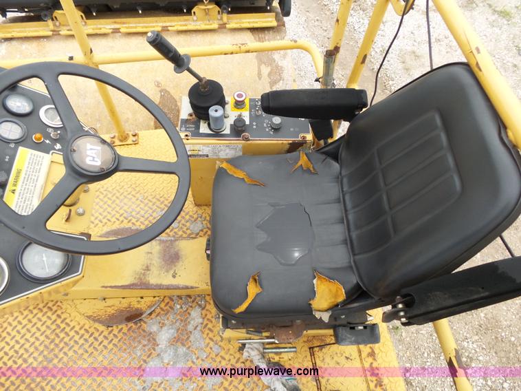 image for item K1180 2001 Caterpillar CB-534C double drum roller