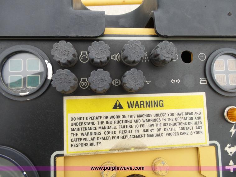 image for item K1180 2001 Caterpillar CB-534C double drum roller