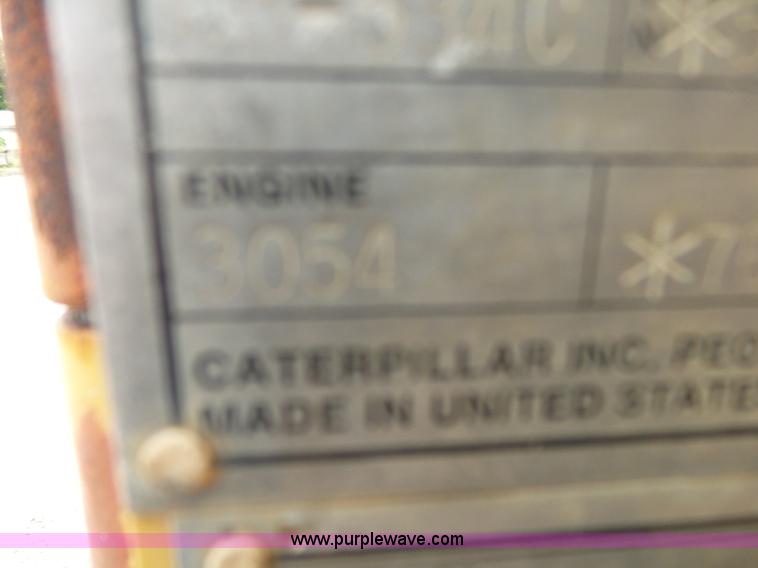 image for item K1180 2001 Caterpillar CB-534C double drum roller