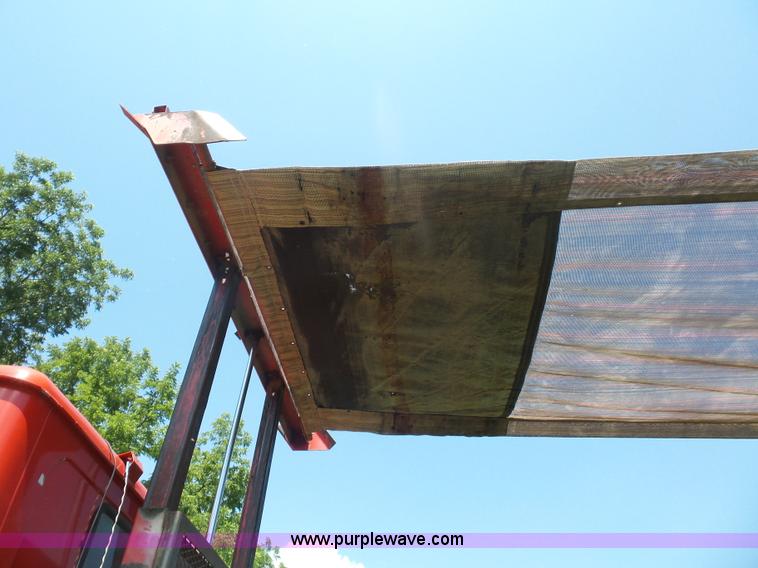 image for item K1708 1999 Volvo WG64 roll-off truck