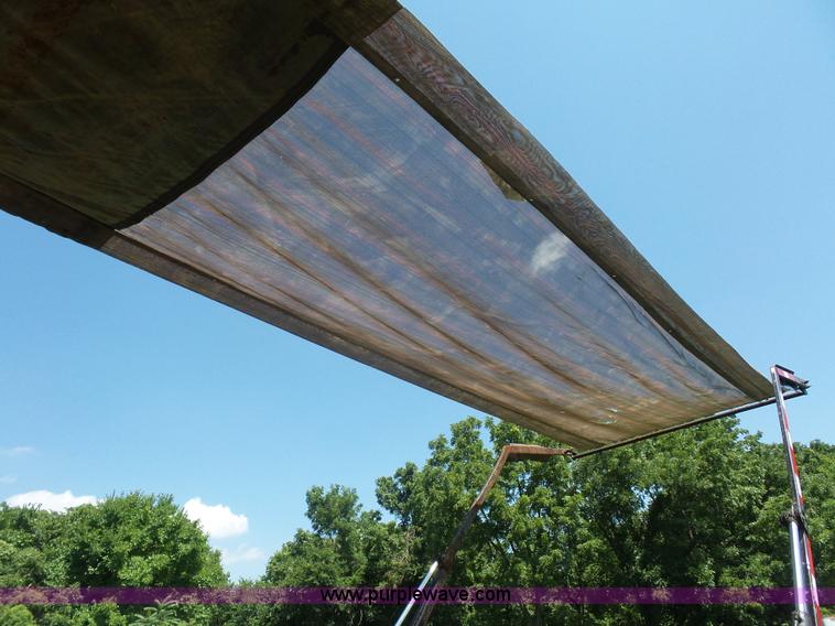 image for item K1708 1999 Volvo WG64 roll-off truck