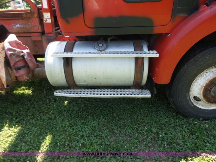 image for item K1708 1999 Volvo WG64 roll-off truck