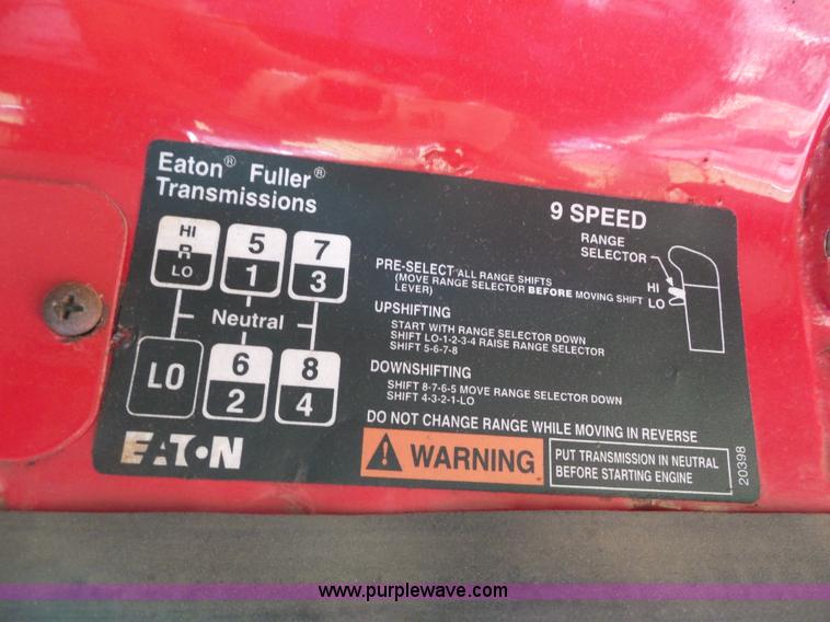 image for item K1708 1999 Volvo WG64 roll-off truck