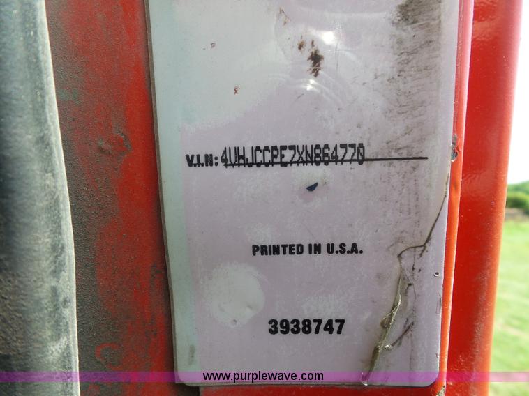 image for item K1708 1999 Volvo WG64 roll-off truck