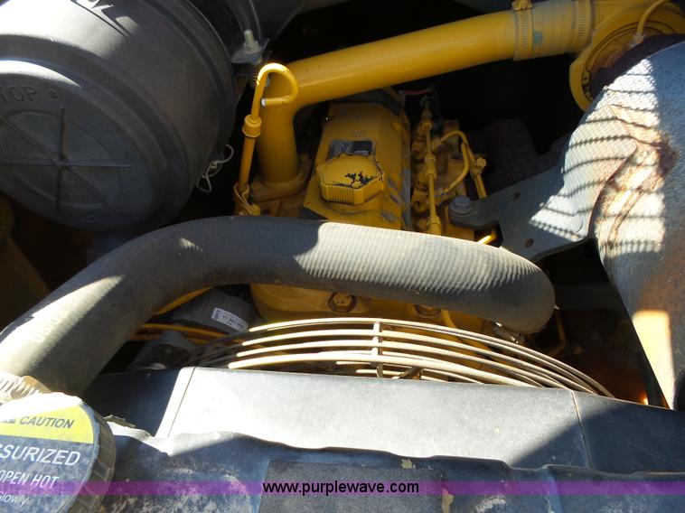 image for item K2175 2003 John Deere 250 Series II skid steer