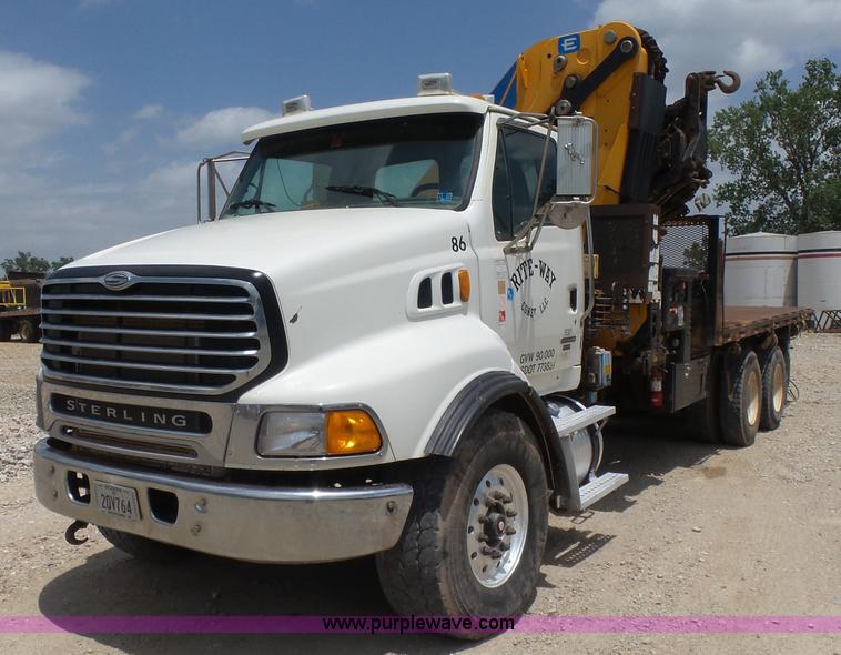 image for item K3175 2005 Sterling flatbed truck with knuckle boom