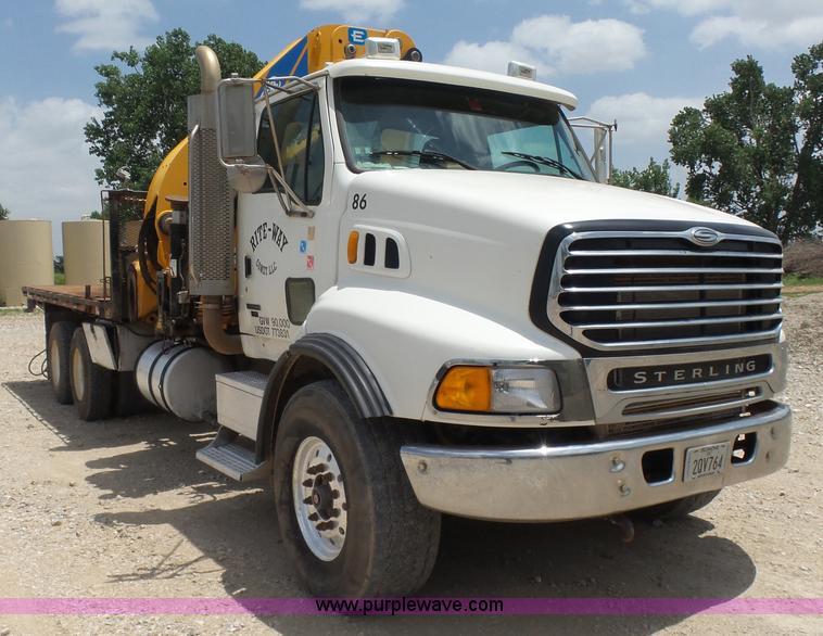 image for item K3175 2005 Sterling flatbed truck with knuckle boom