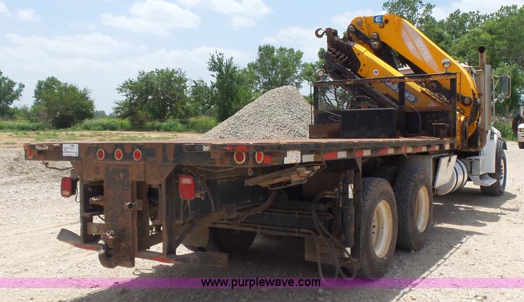 image for item K3175 2005 Sterling flatbed truck with knuckle boom