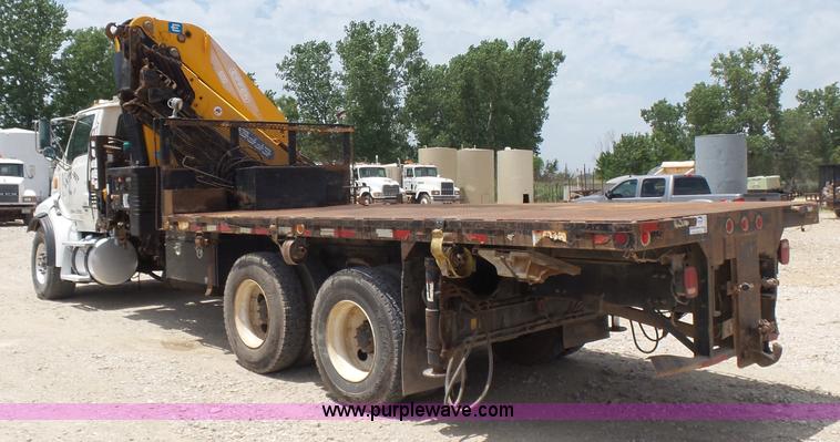 image for item K3175 2005 Sterling flatbed truck with knuckle boom