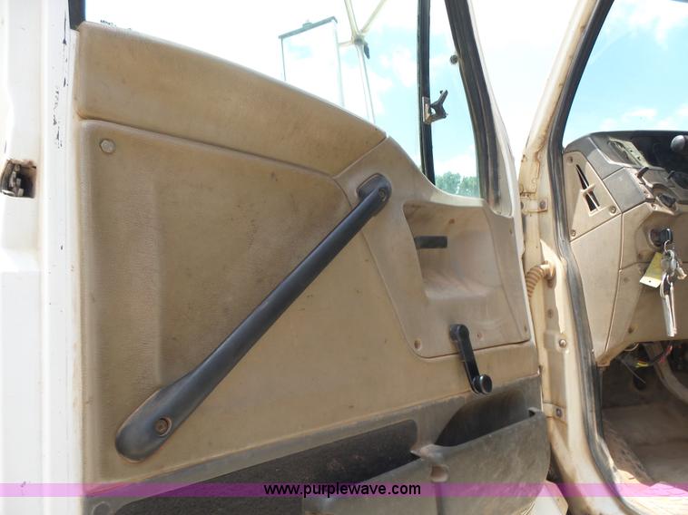 image for item K3175 2005 Sterling flatbed truck with knuckle boom