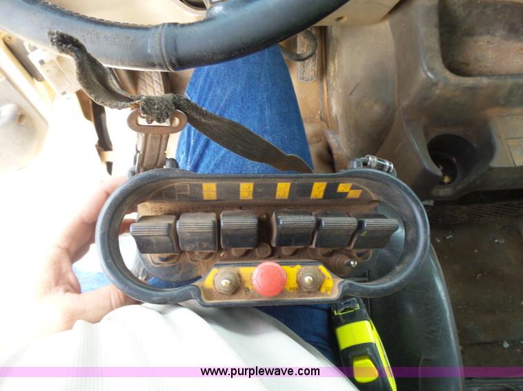 image for item K3175 2005 Sterling flatbed truck with knuckle boom