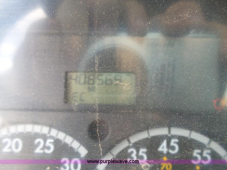 image for item K3175 2005 Sterling flatbed truck with knuckle boom