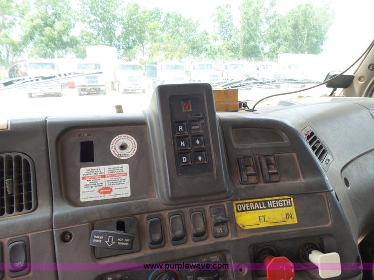 image for item K3175 2005 Sterling flatbed truck with knuckle boom