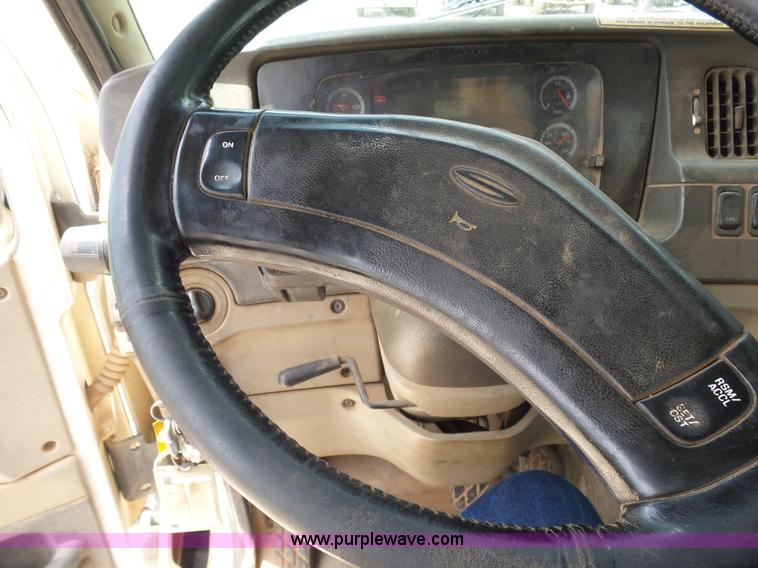 image for item K3175 2005 Sterling flatbed truck with knuckle boom