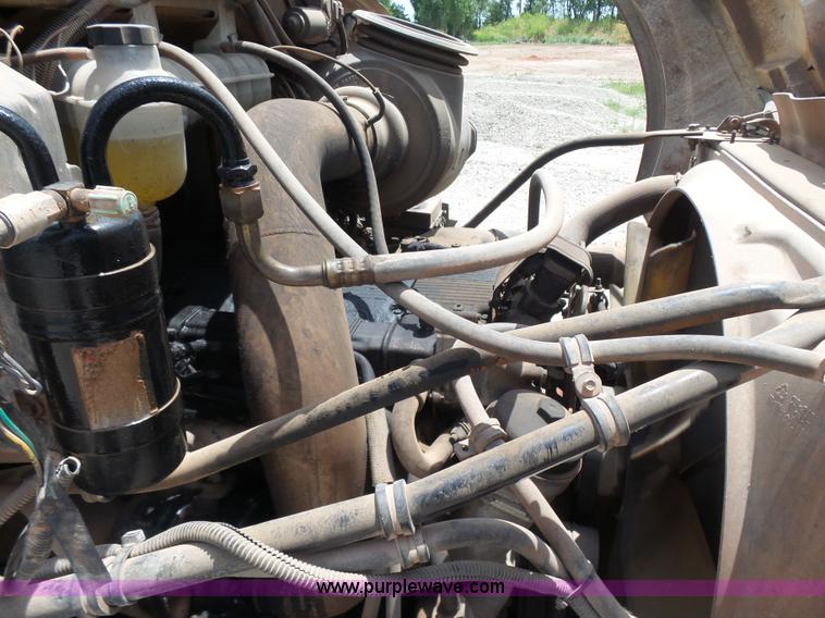 image for item K3175 2005 Sterling flatbed truck with knuckle boom