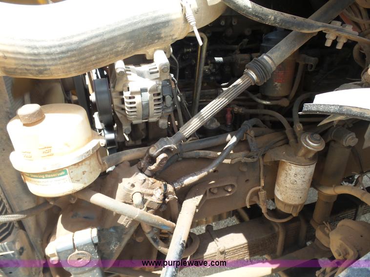 image for item K3175 2005 Sterling flatbed truck with knuckle boom