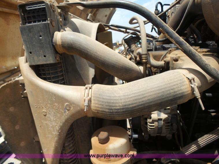 image for item K3175 2005 Sterling flatbed truck with knuckle boom