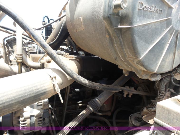 image for item K3175 2005 Sterling flatbed truck with knuckle boom