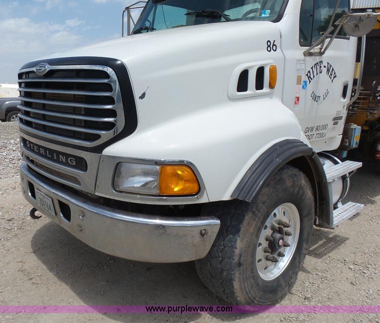 image for item K3175 2005 Sterling flatbed truck with knuckle boom