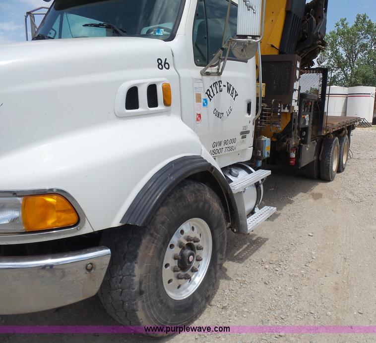 image for item K3175 2005 Sterling flatbed truck with knuckle boom