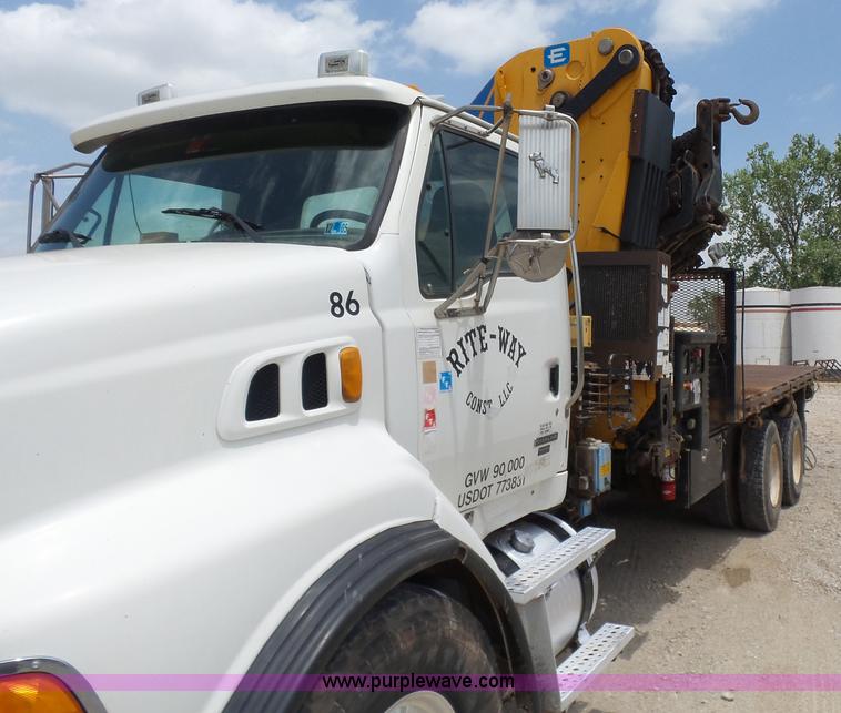 image for item K3175 2005 Sterling flatbed truck with knuckle boom